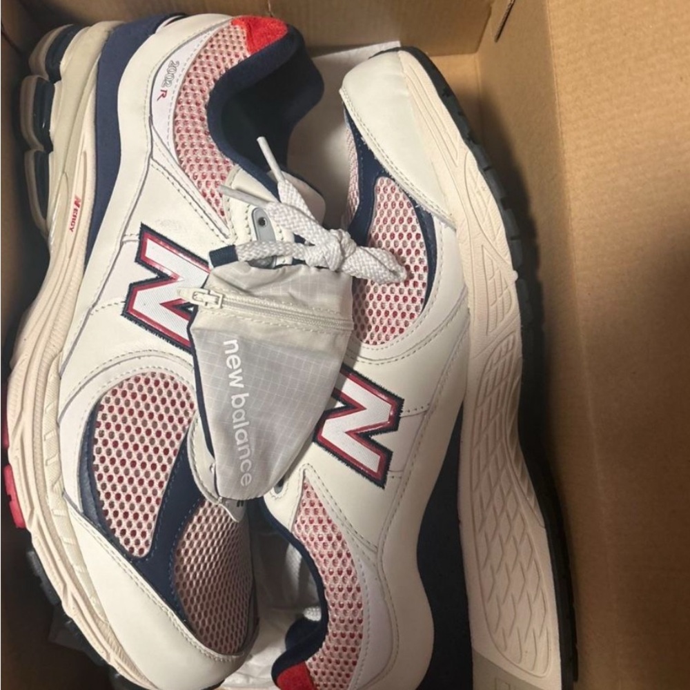 New Balance White and Red Athletic Shoes